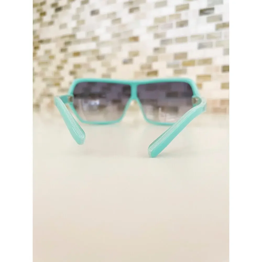 Stussy Mint Green Shield Sunglasses with Gradient Smoke Lenses